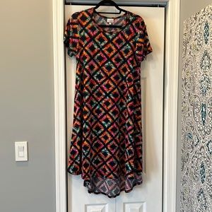 EUC LuLaRoe Carly with no pocket, size S. Blue diamond and multi color pattern.